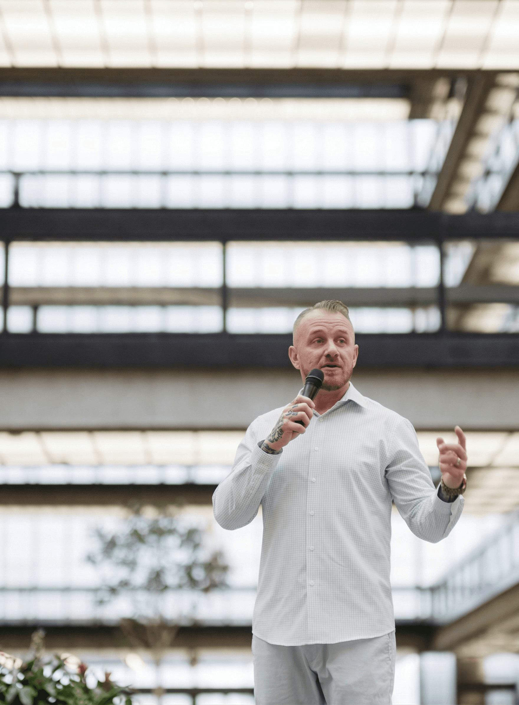 Daniel McGowan speaking at an outdoor event
